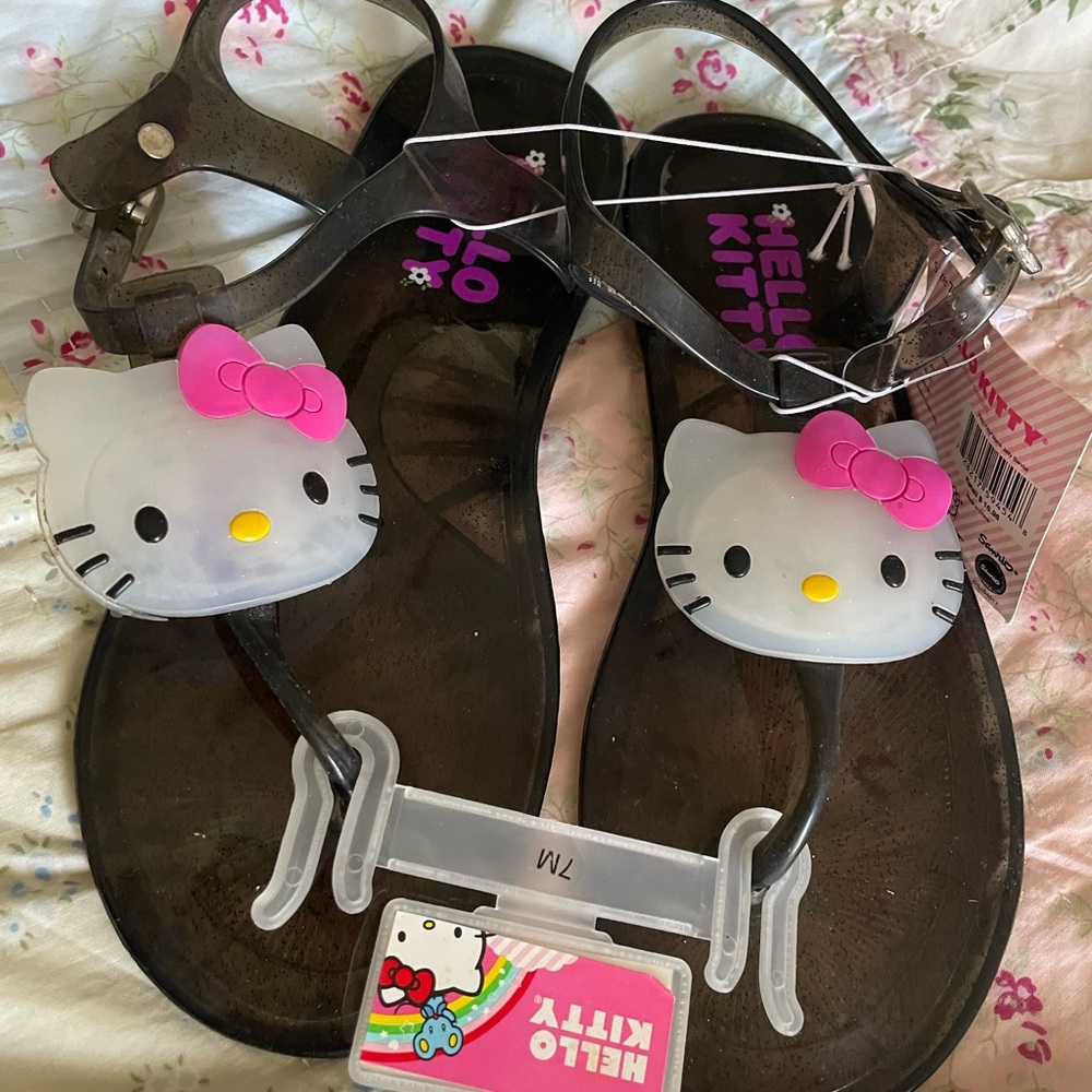 Woman’s Hello Kitty Black and Pink Sandals with Iconic Design